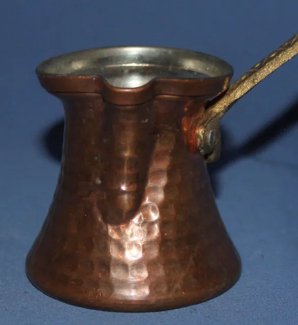 Vintage copper coffee pot with brass handle