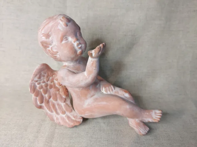 Terracotta Shelf Sitting Cherub / Blowing Kiss Cherub Ornamental Figure