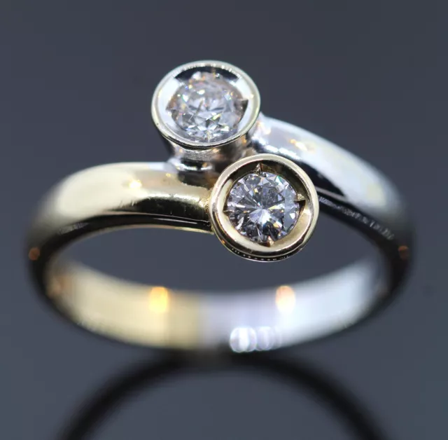 CROSS OVER RING MIT 2 BRILLANTEN  0,40ct AUS 585/- GOLD BICOLOR WERT 1398,- €