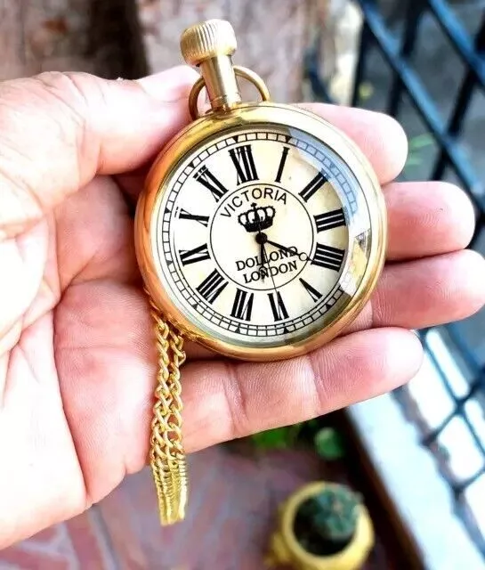 Reloj de bolsillo náutico vintage con botón pulsador con acabado de latón...