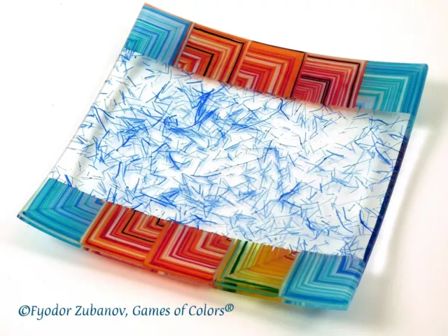 A decorative fused glass plate "Origin of the Order".