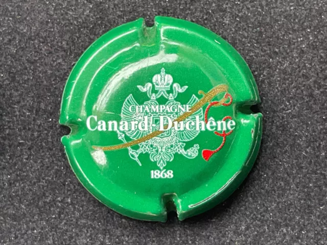 capsule de champagne "canard duchêne n°55  " côte de 1,5 euros.