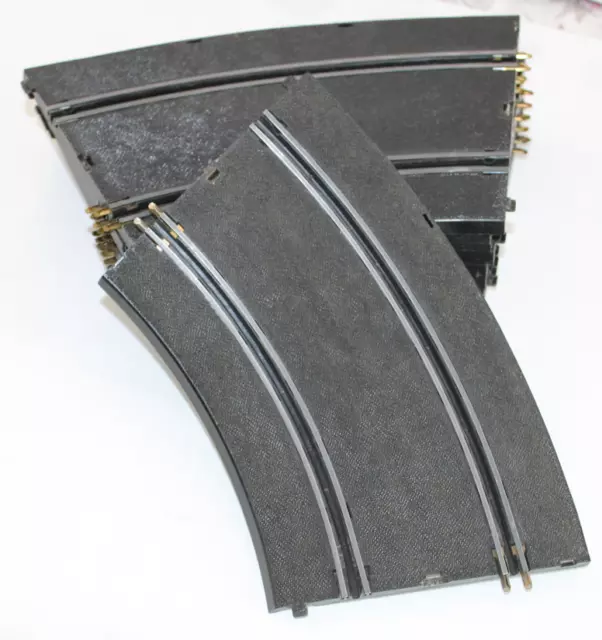 Lot n° 1 de 16 rails virages relevés réf 323 circuit " JOUEF "  pas  SCALEXTRIC