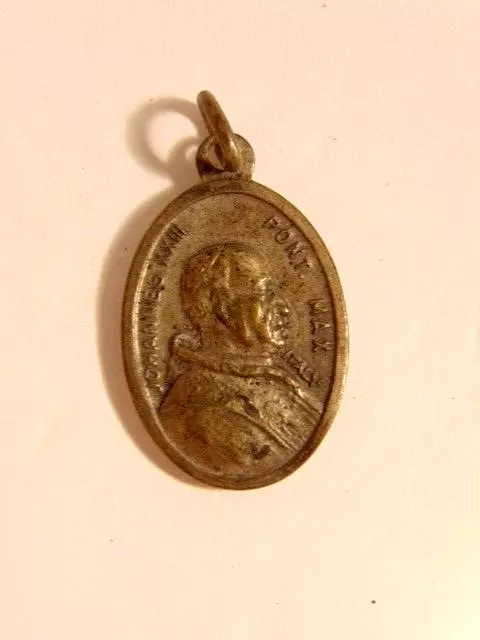 older silver color religious medal showing Pope John XXIII ' Peter & Paul on rev