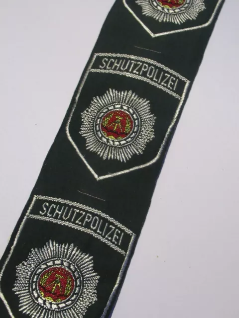 New East German Schutzpolizei insignia shoulder badge communist DDR volkspolizei