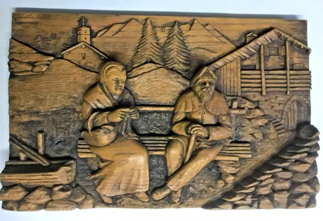 Tableau en bois sculpté : Savoyards sur un banc -- signé A.G.