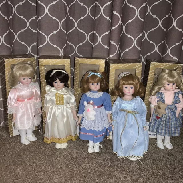 Lot of 5 International Collectors Society Land Of Enchantment Porcelain Dolls