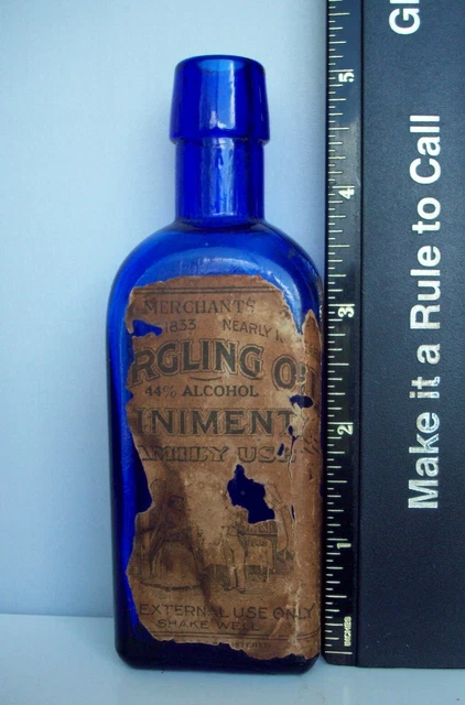 Cobalt Blue Merchant’s Gargling Oil Bottle, Original Label