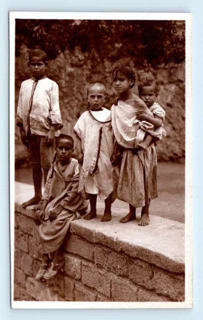 RPPC scenes Enfants arabes, arab children in Morocco Africa Postcard