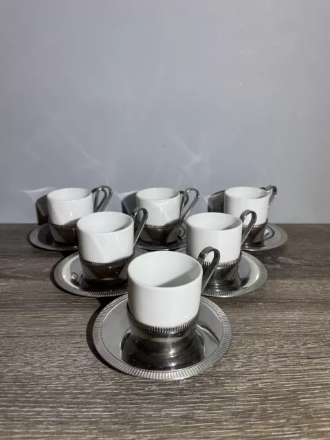 Service de 6 tasses à café + supports et soucoupes. Orfèvrerie « Létang Rémy »