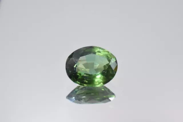 Australian Natural Faceted Sapphire -1.2 CT Parti Green Oval Gemstone