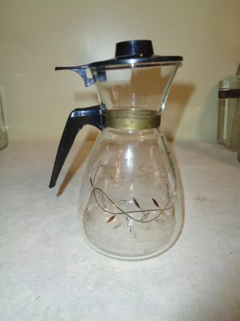 https://www.picclickimg.com/Pk4AAOSwDC5gDEaV/Tricolette-Vintage-4-Cup-Glass-Coffee-Carafe-Pitcher.webp