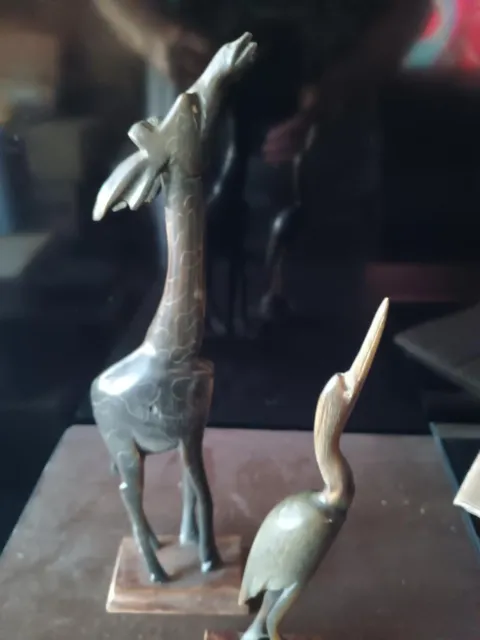hand carved wooden figures giraffe and pelican