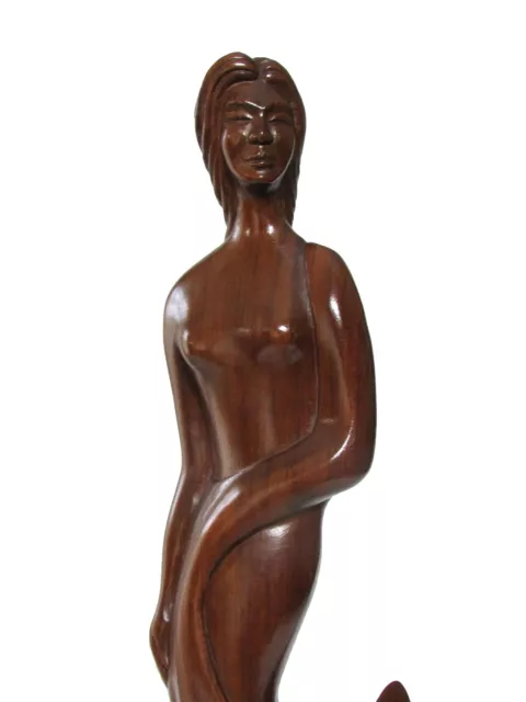 Statue of a beautiful woman in hand carved wood