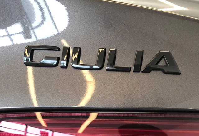 Original Alfa Romeo Giulia Black Rear Logo Emblem - OEM Part 50556906, Adhesive Type
