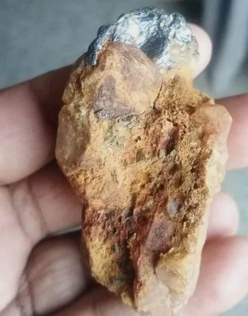 Mineral Molybdenite with quartz ,Pyrite or chalcopyrite & iron oxide