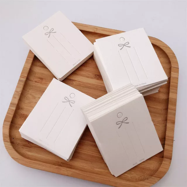 50 pcs Tarjetas de exhibición de arco de baratija de tarjeta de horquilla blanca