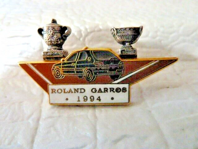 pin's Roland Garros tennis 1994 perrier dorée golden Signé