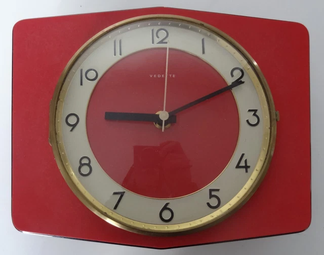 Horloge murale années 60 en formica imitation bois Jaz – Hello Broc