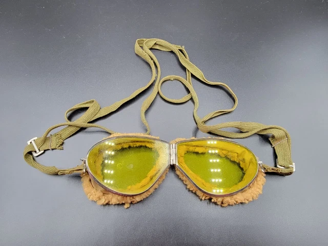 WWII era US aviator goggles with unusual amber colored lenses with strap WWII era US aviator goggles with unusual amber colored lenses with strap