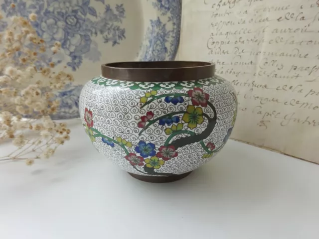 Antique Chinese cloisonne bowl, white background and multi coloured blossom tree