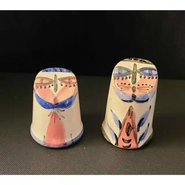 Vintage hand-crafted clay totem salt and pepper shakers