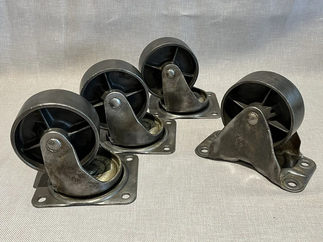 4 Used 4" HD Bassick Cast Iron Casters - 3 Swivel #461 and 1 Stationary #438