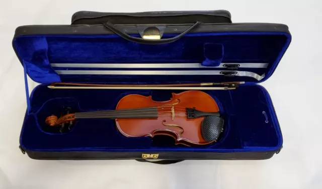 Violin 1/2 size made in Chech Republic with Erich Steiner bow and case.