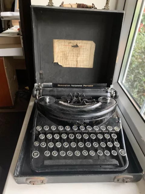 Vintage typewriter in case - Remington Noiseless Portable model.