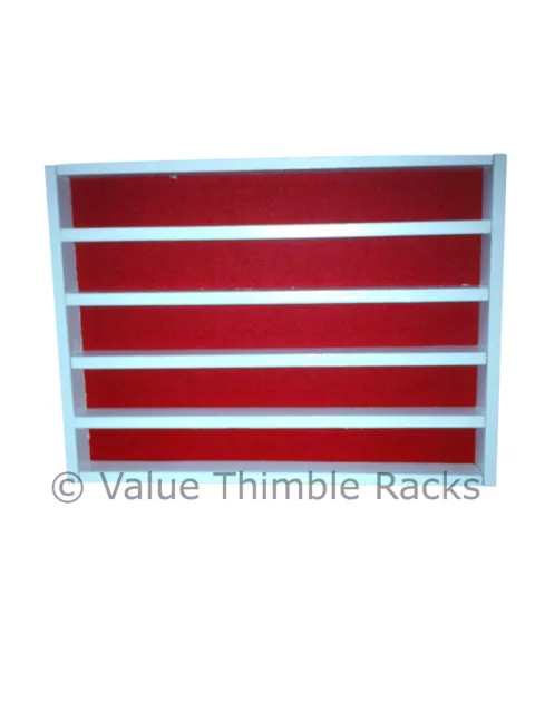 50 thimble display rack in white with red felt back