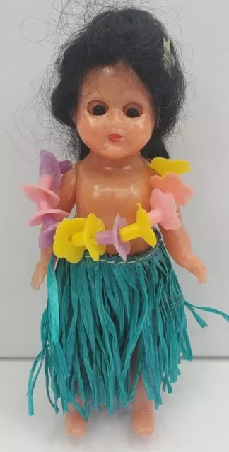 Vintage Celluloid Hawaiian Girl Sleepy Eyes Hula Grass Skirt Flower Lei