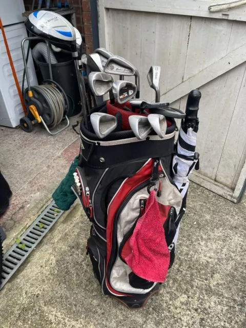 Full set of golf clubs and bag plus accessories and trolley