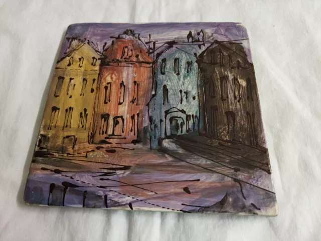 Vtg. MCM handpainted tile trivet: buildings. Signed.