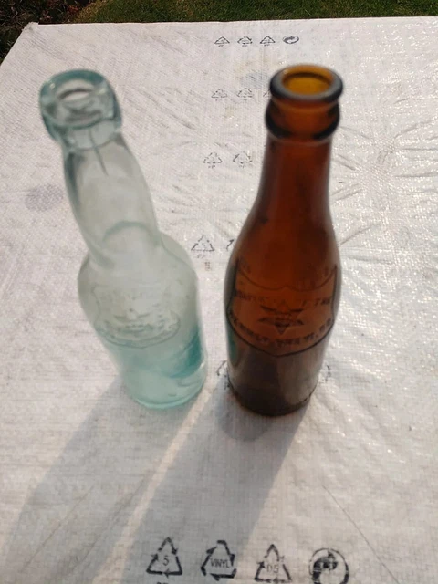 Two VINTAGE Renner Beer  Embossed  12oz Bottles, Amber & Clear, Youngstown Ohio.