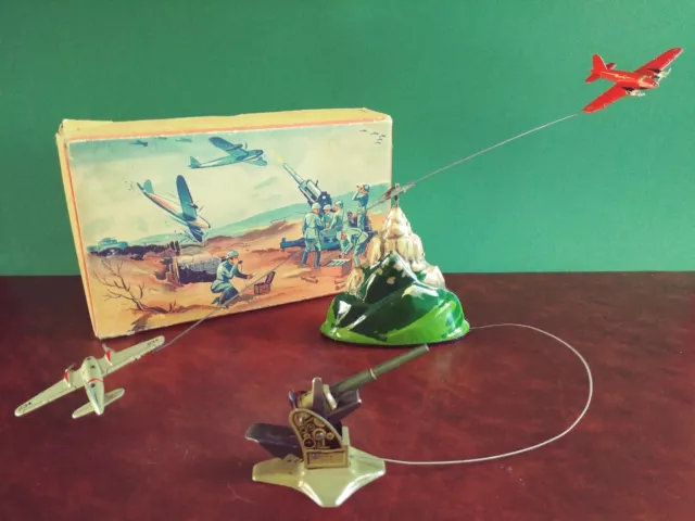 Seltener 1930er Biller Flugzeug Flakspiel Blechspielzeug mit OVP