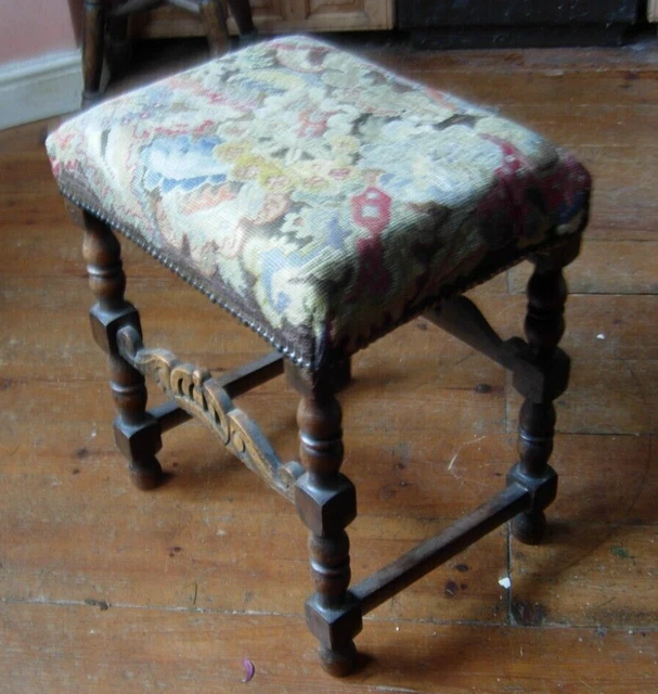 Antique wooden stool with tapestry top & crown design on side bars, piano stool? Antique wooden stool with tapestry top & crown design on side bars, piano stool?
