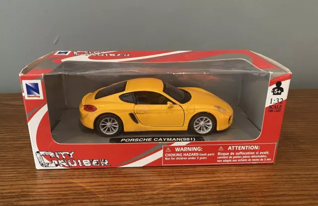 NEW-RAY CITY CRUISER Yellow Porsche Cayman 981 Boxed 1.32 Scale Die Cast Car