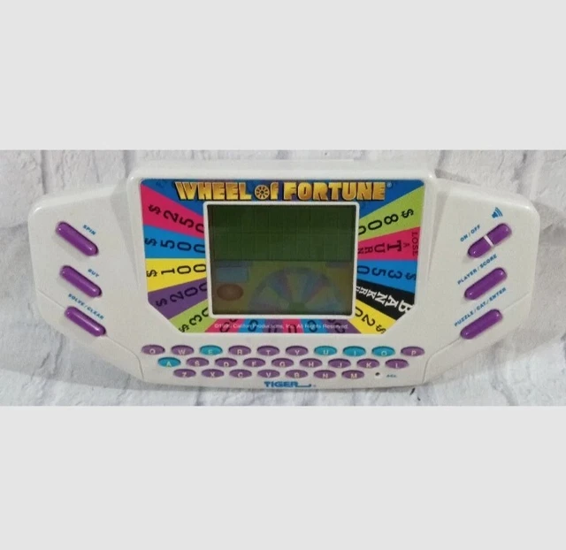 VINTAGE WHEEL OF Fortune Tiger Handheld Game With Cartridge 1995