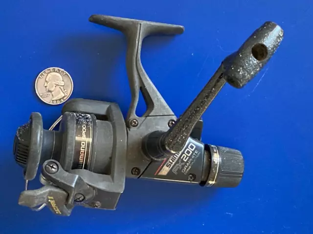 VINTAGE SHIMANO FX200 spinning reel. Rear Drag, Trigger, very good  condition $16.95 - PicClick