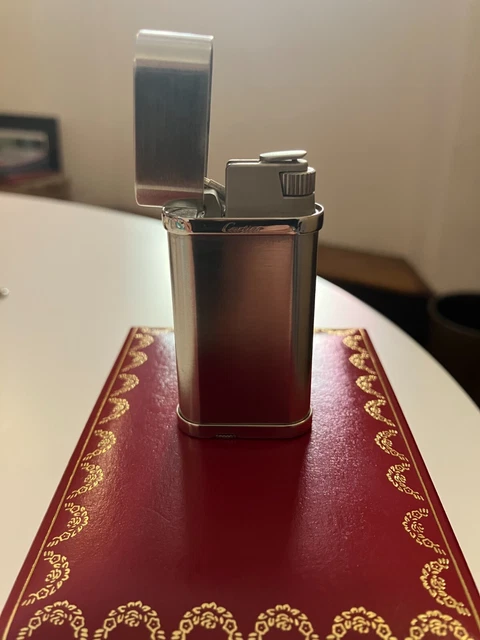 Accendino Cartier con finiture in acciaio e platino