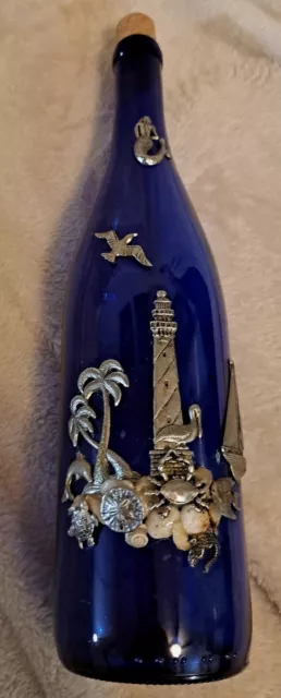 Deep Blue Bottle With Silver Ocean Theme