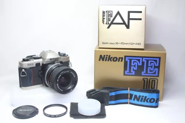 Excelente cámara de película Nikon FE10 SLR de 35 mm y lente Nikkor con...
