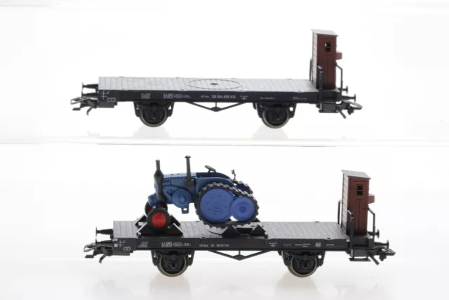 H0 Märklin DB Flachwagen mit Bremserhaus und Traktor blau Güterwagen AC M41