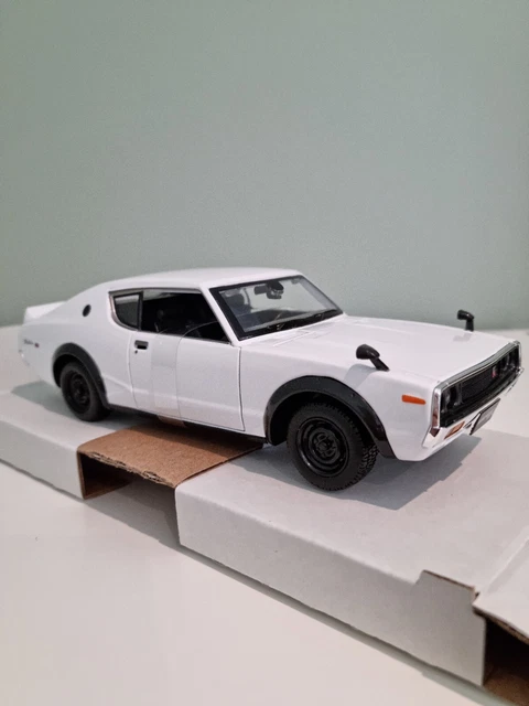 Miniature Kyosho 1/18 Nissan Skyline GTR - Diecast Rouge Métal DC26123U