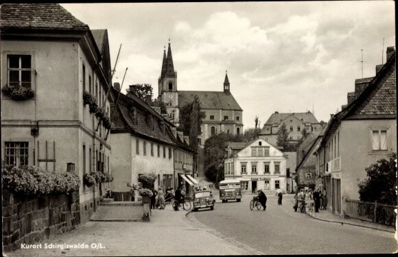Ak Schirgiswalde in Sachsen, Straßenpartie, Kirche - 2776077