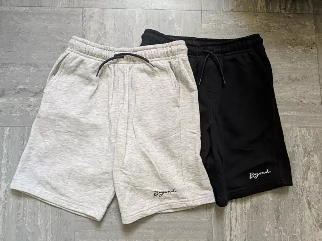 2 paia pantaloncini sportivi George età 9-10. 1 nero 1 grigio