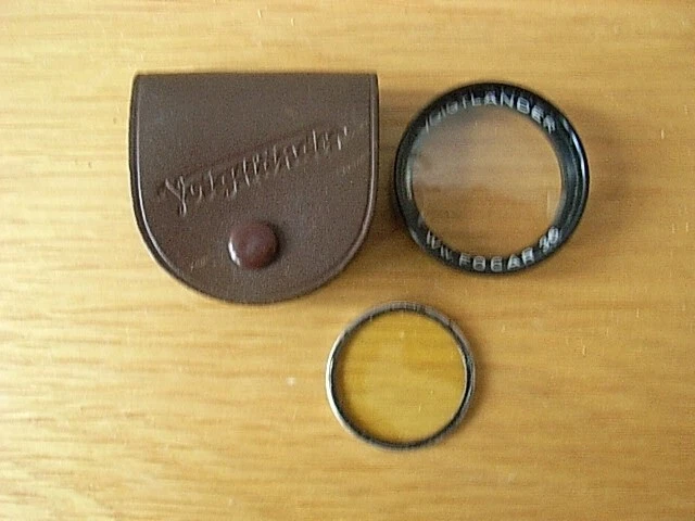 Lente voiglander Ww Focar 36 + filtro de momento en estuche