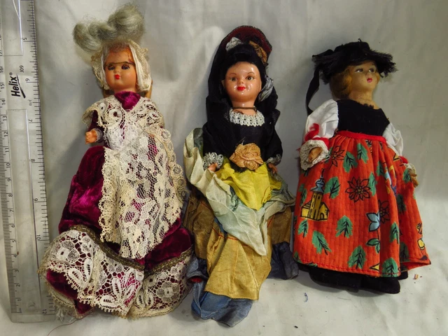 3 small child costume dolls