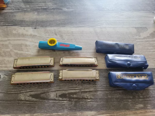 4 Vtg. Hohner harmonica's and A kazoo. B,F,G,C