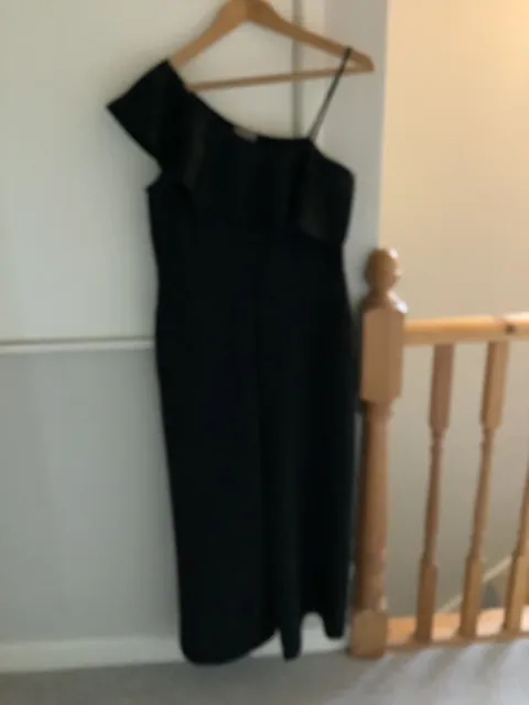 Oasis black frill top wide leg jump suit size 12